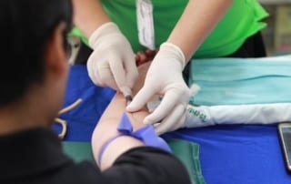 technician drawing blood