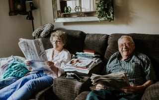 Elderly couple on couch